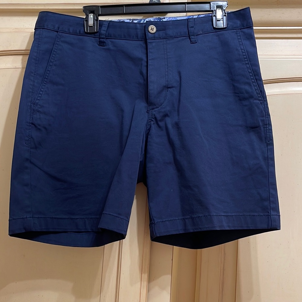 Tommy Bahama 34” waist/ 8” inseam mens navy shorts.